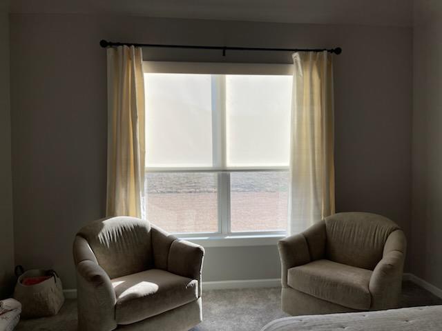 Sometimes it's all about creating a perfect pairing-and that's what we did in this Owasso home! Here, we matched Roller Shades with Custom Draperies for a look that dresses up this room!