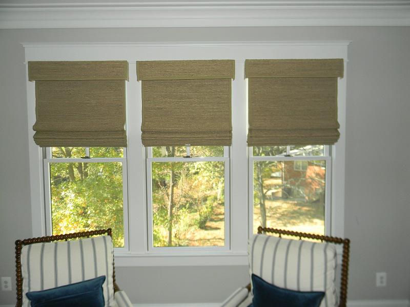 Welcome to Alexandria, where we have some beautiful backyard views! You can enjoy one of those views through the windows in this home-which look amazing with our Woven Wood Shades!