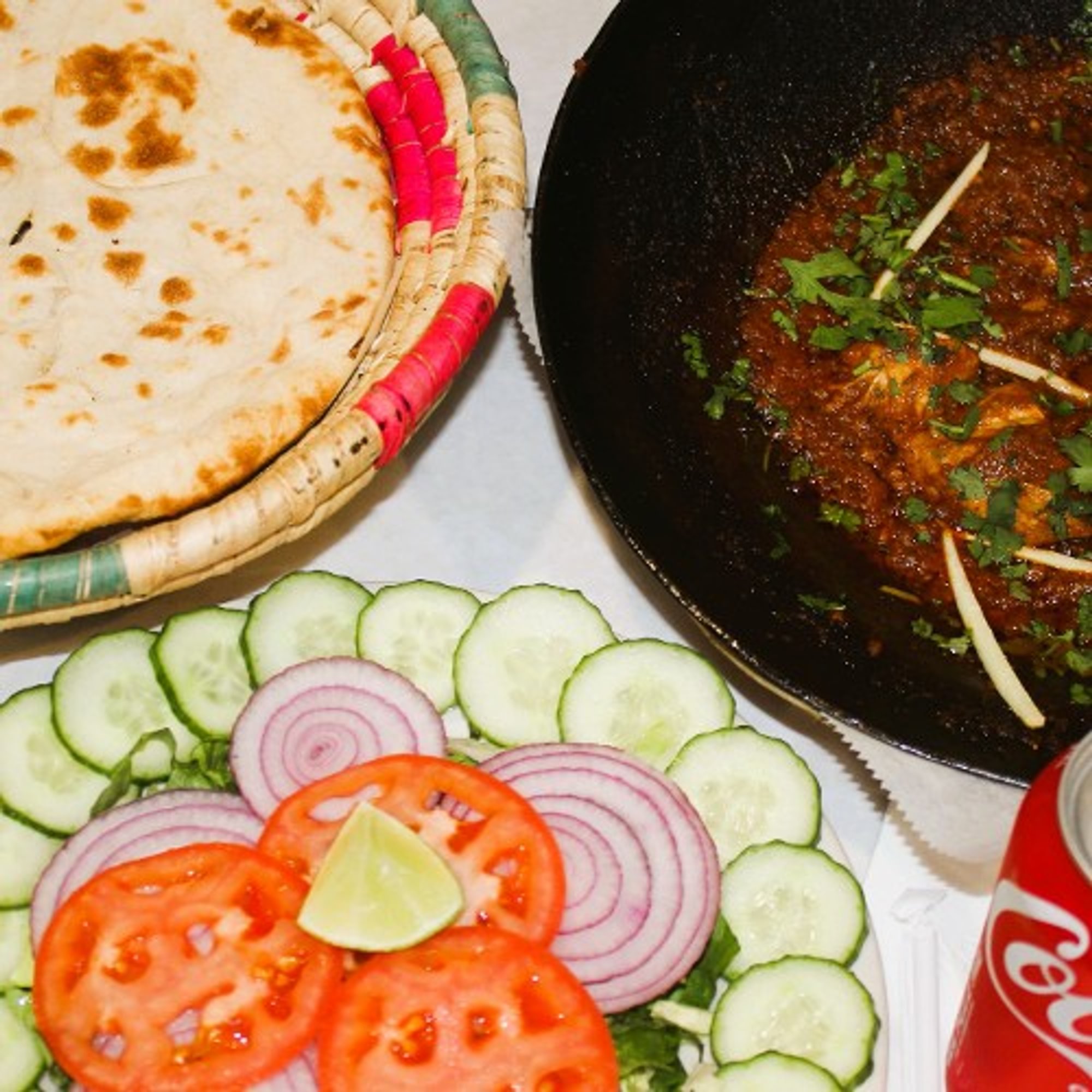 Chicken Kadai (Half Pound) +2 Plain Naan + Can of Soda +Salad +Green Sauce