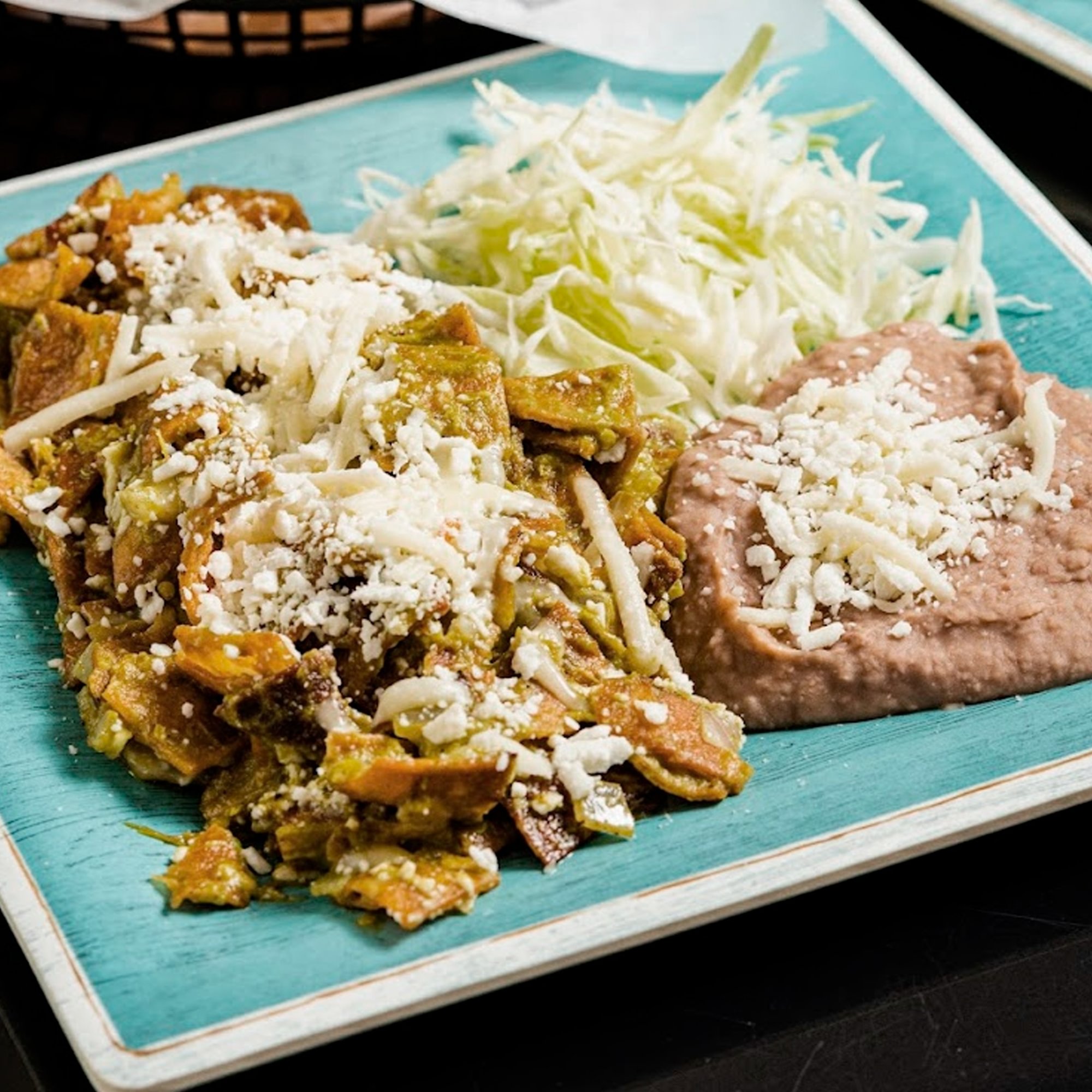 P. Green Chilaquiles with 2 Eggs / Chilaquiles Verdes con 2 Huevos