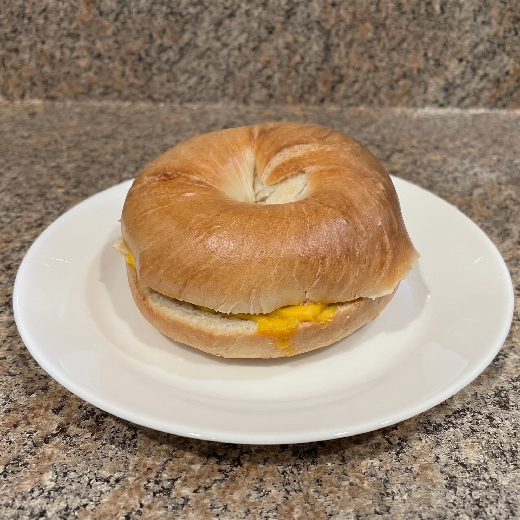 2 Eggs, Meat & Cheese Sandwich with Hash Browns