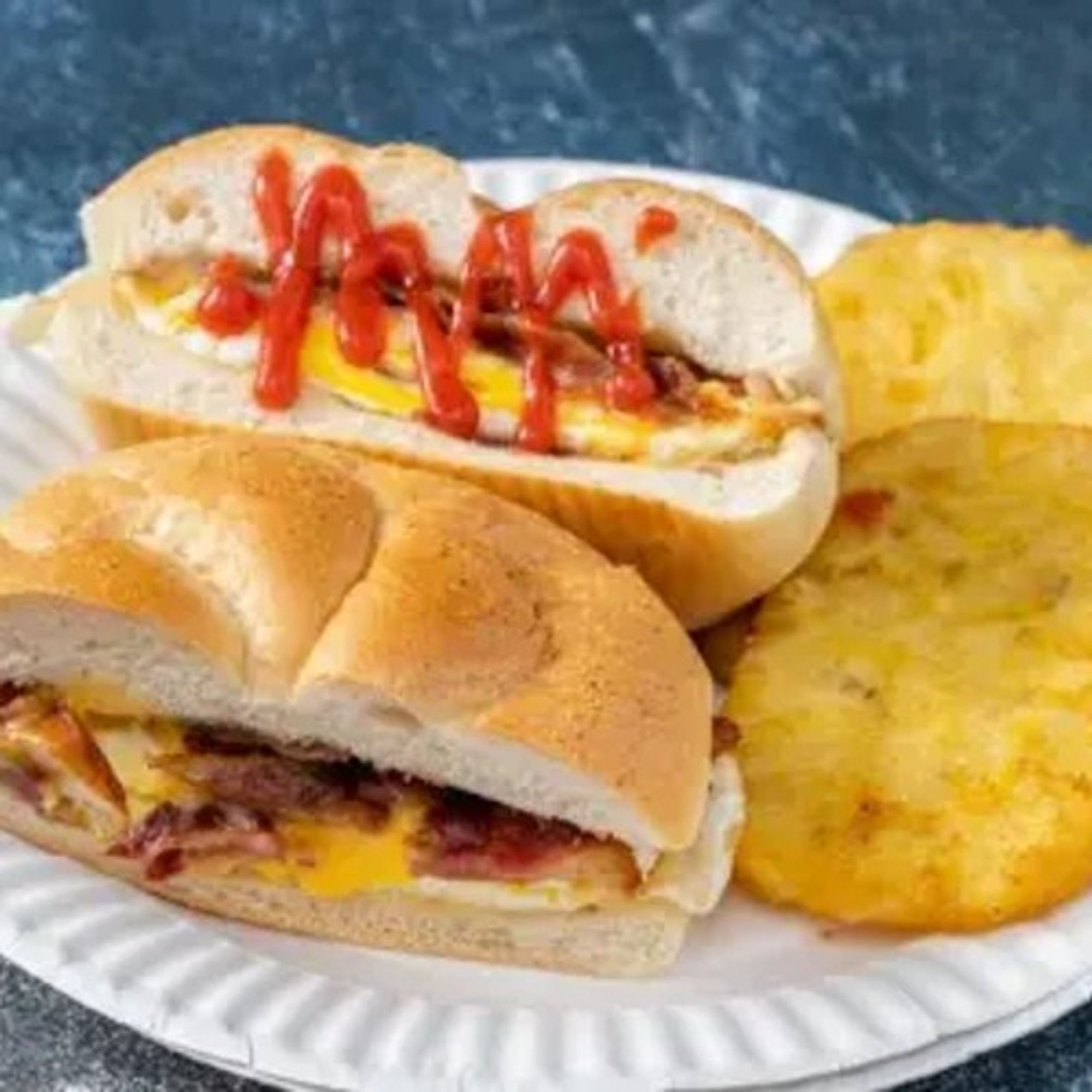 Bacon, Sausage, or Ham, Egg and Cheese Sandwich