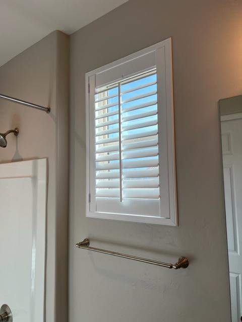 Small shutter installed in a bathroom window.  Sahuarita, AZ