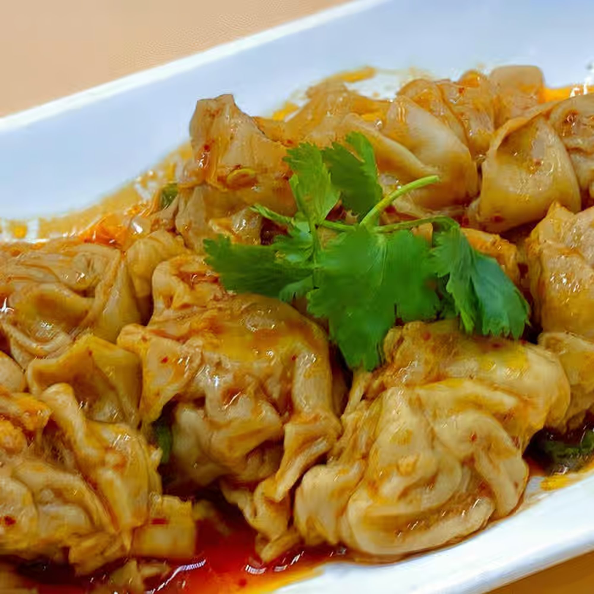 Shrimp Wontons in Spicy Sauce 紅油炒手
