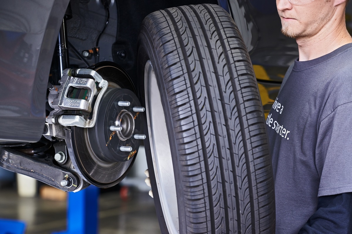 A Meineke technician installing new tires in one of our many locations around the country.