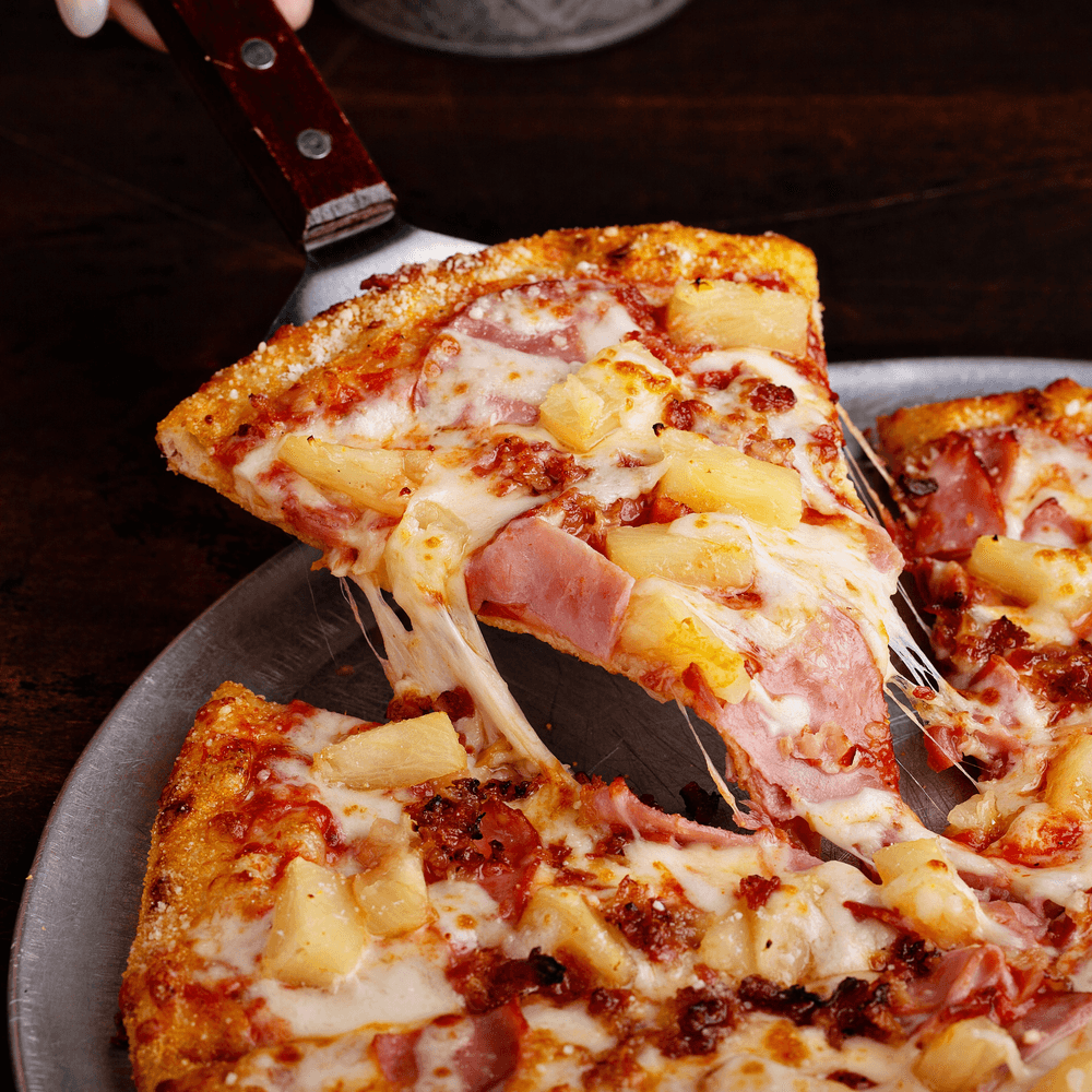 Hawaiian pizza slice