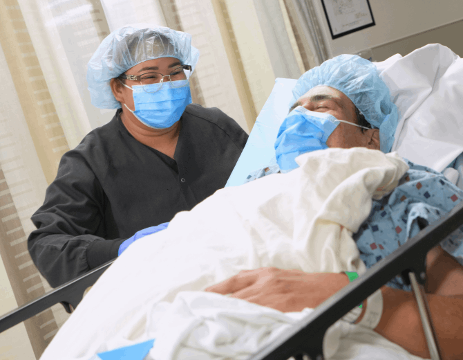 A staff member and a patient at Azura Vascular Care Union
