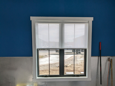 Roller Shades can be easy to clean making them a great option for a garage window. Budget Blinds of Rock Springs is here to help you find the perfect fit.