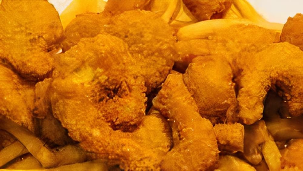 Shrimp Loaded Fries Crispy Fries Topped with Cheese, Crispy Shrimp Coleslaw and Pickles Drizzled...