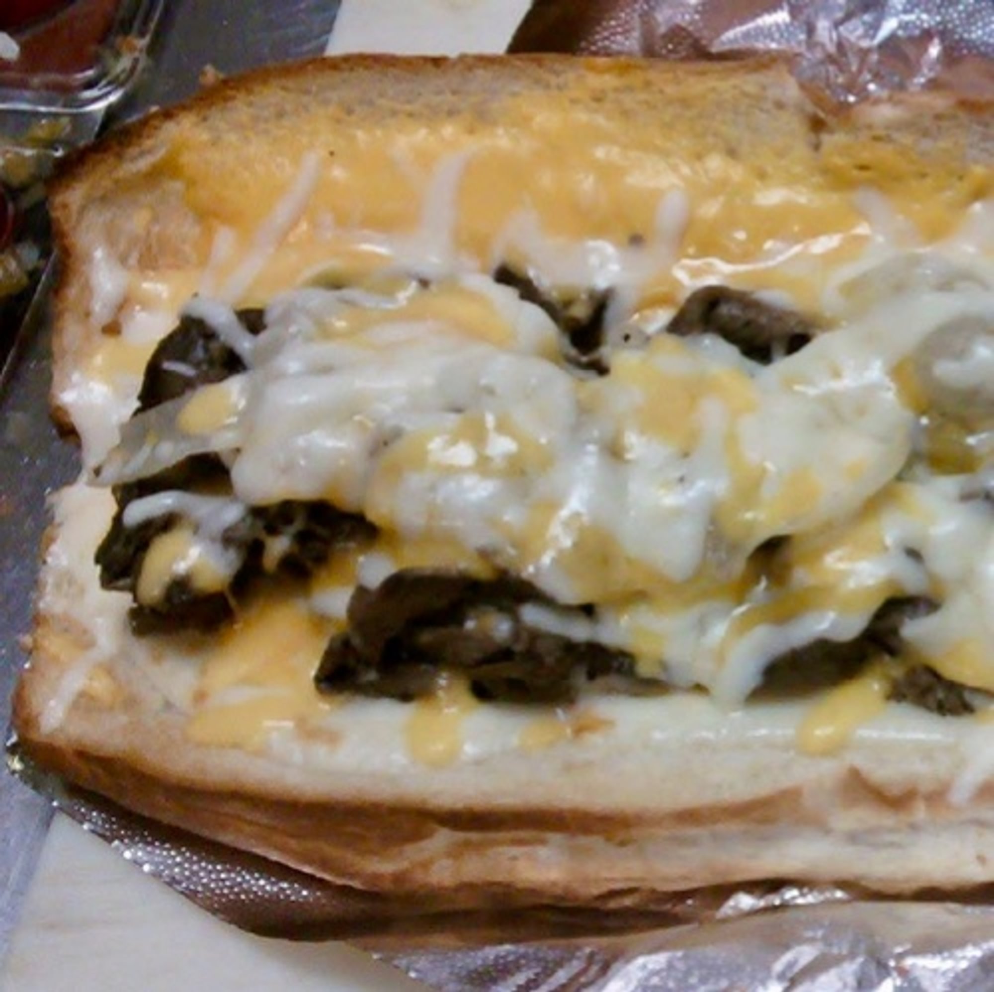 #15 Half Cheese Steak Sub.