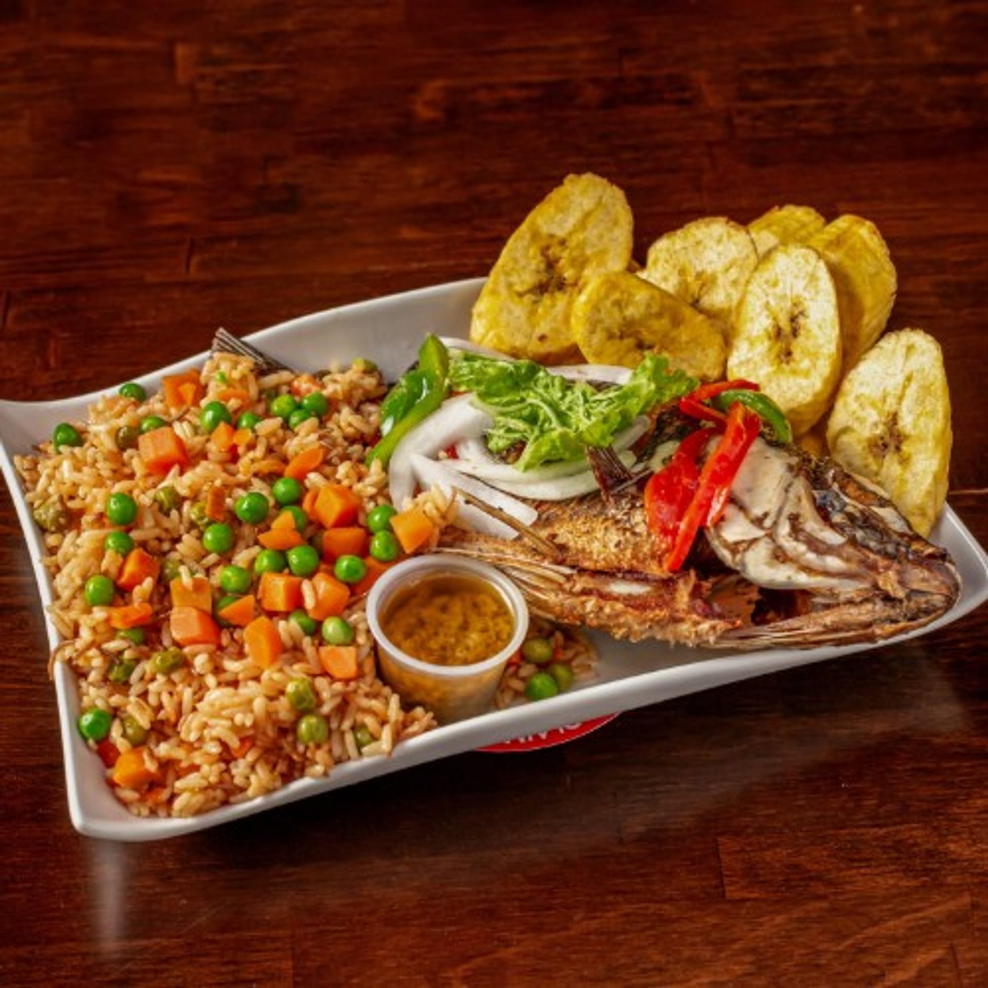 Whole Fried Fish with Plantains or Jollof Rice