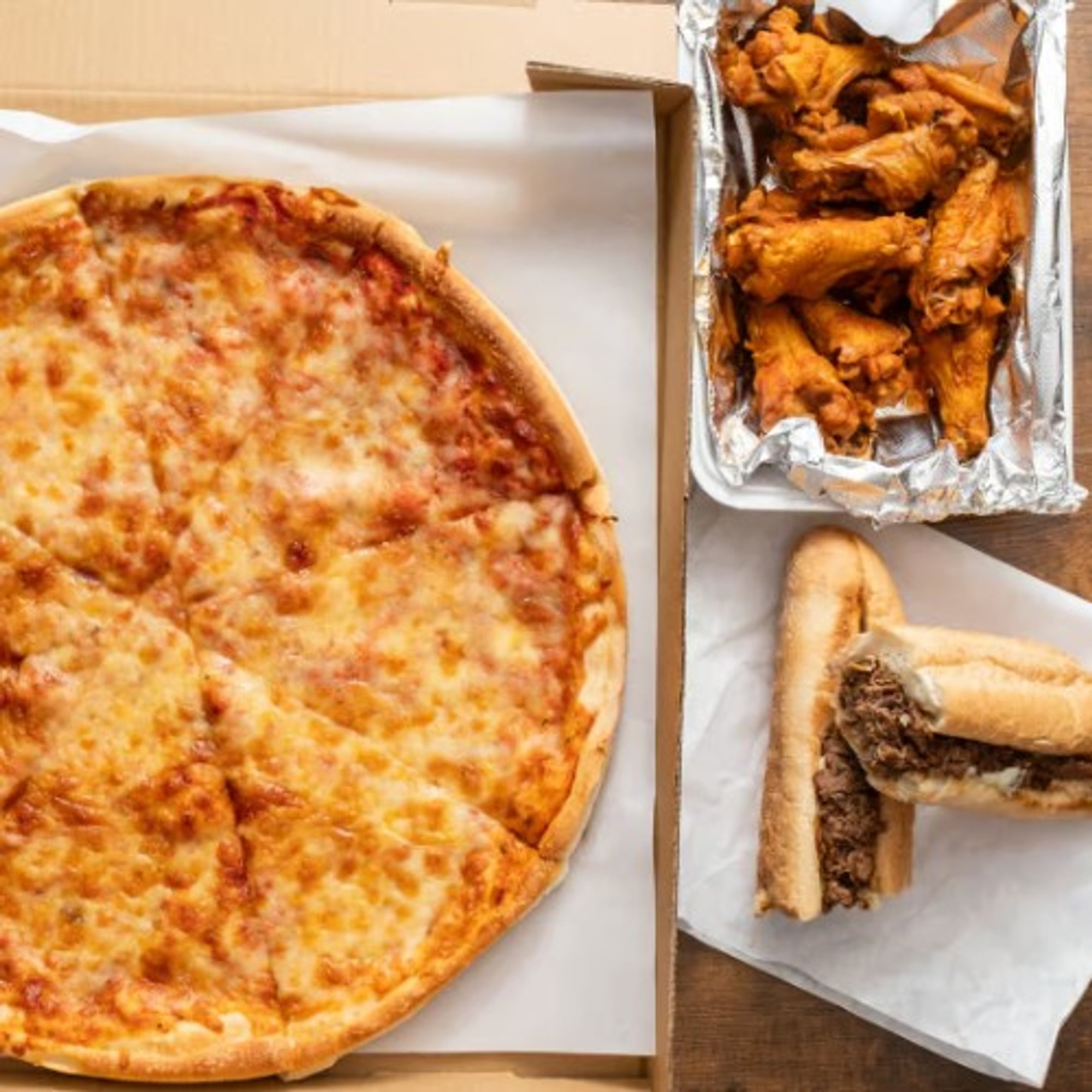 Lg Cheese Pizza 10 Fresh Cut Wings and a Lg Steak Sub for 40$
