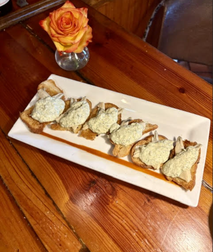 Fresh Anchovies Served Hot on Crostini