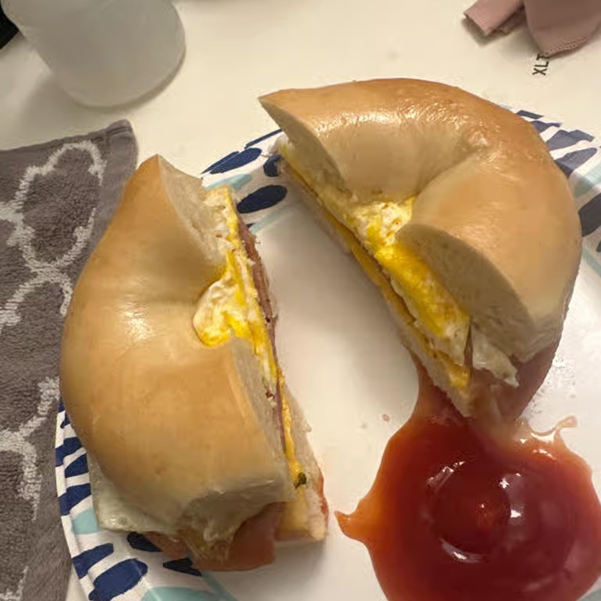 Egg, Meat & Cheese on a bagel