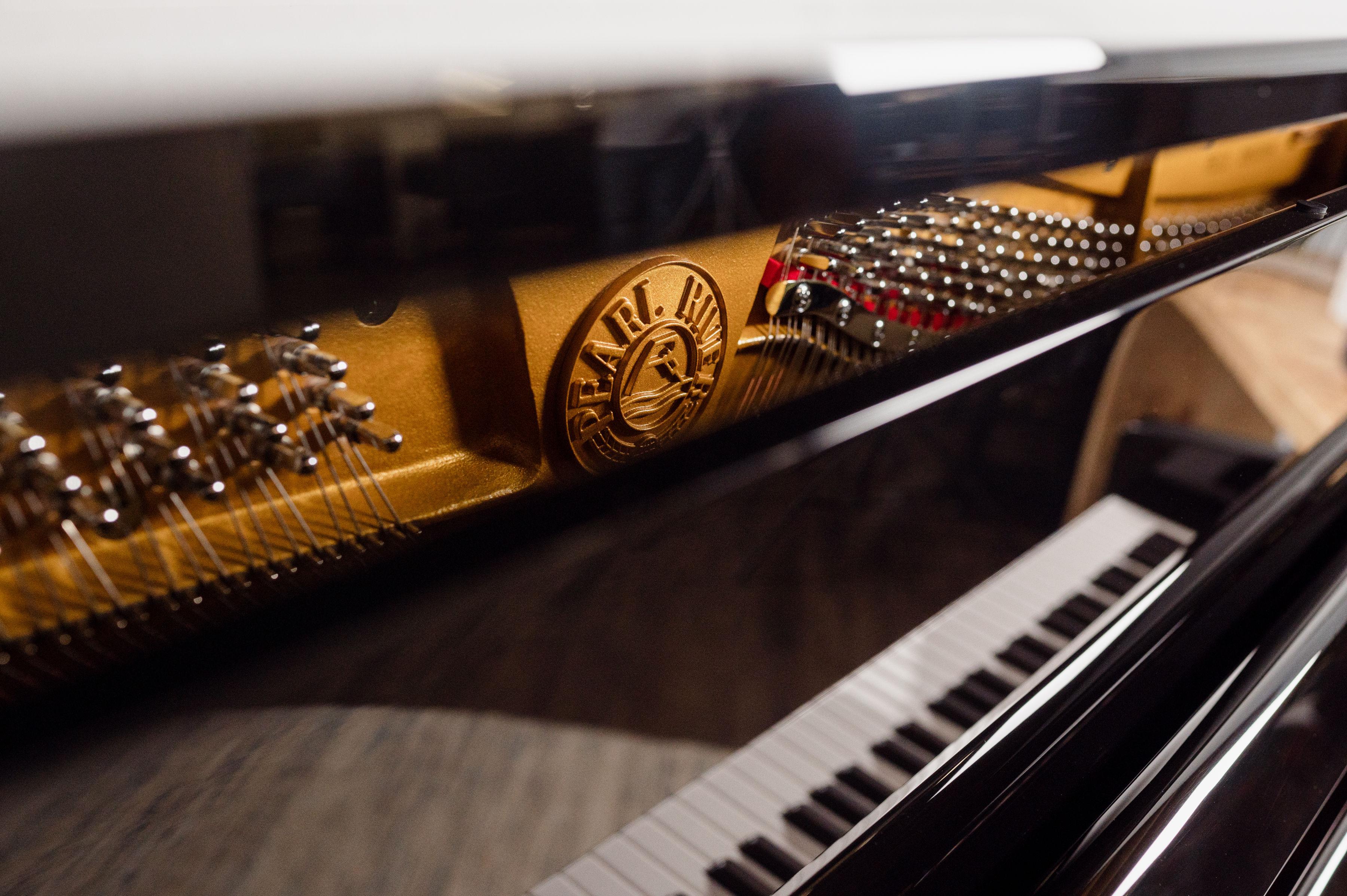 Pearl River Burl Inlay Upright Piano