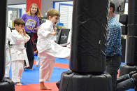 Give your kids the lifelong gifts of personal success, confidence, discipline and self-defense...while making sure they have a TON of fun! Give your kids the lifelong gifts of personal success, confidence, discipline and self-defense...while making sure they have a TON of fun!