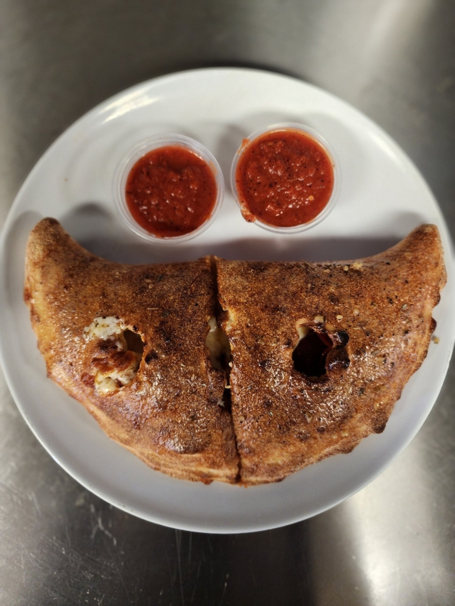 Calzone (includes Mozz and Ricotta Cheese)