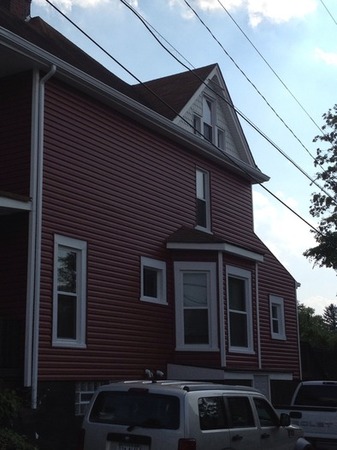 New siding and gutters on a home in Pittsburgh. New siding and gutters on a home in Pittsburgh.