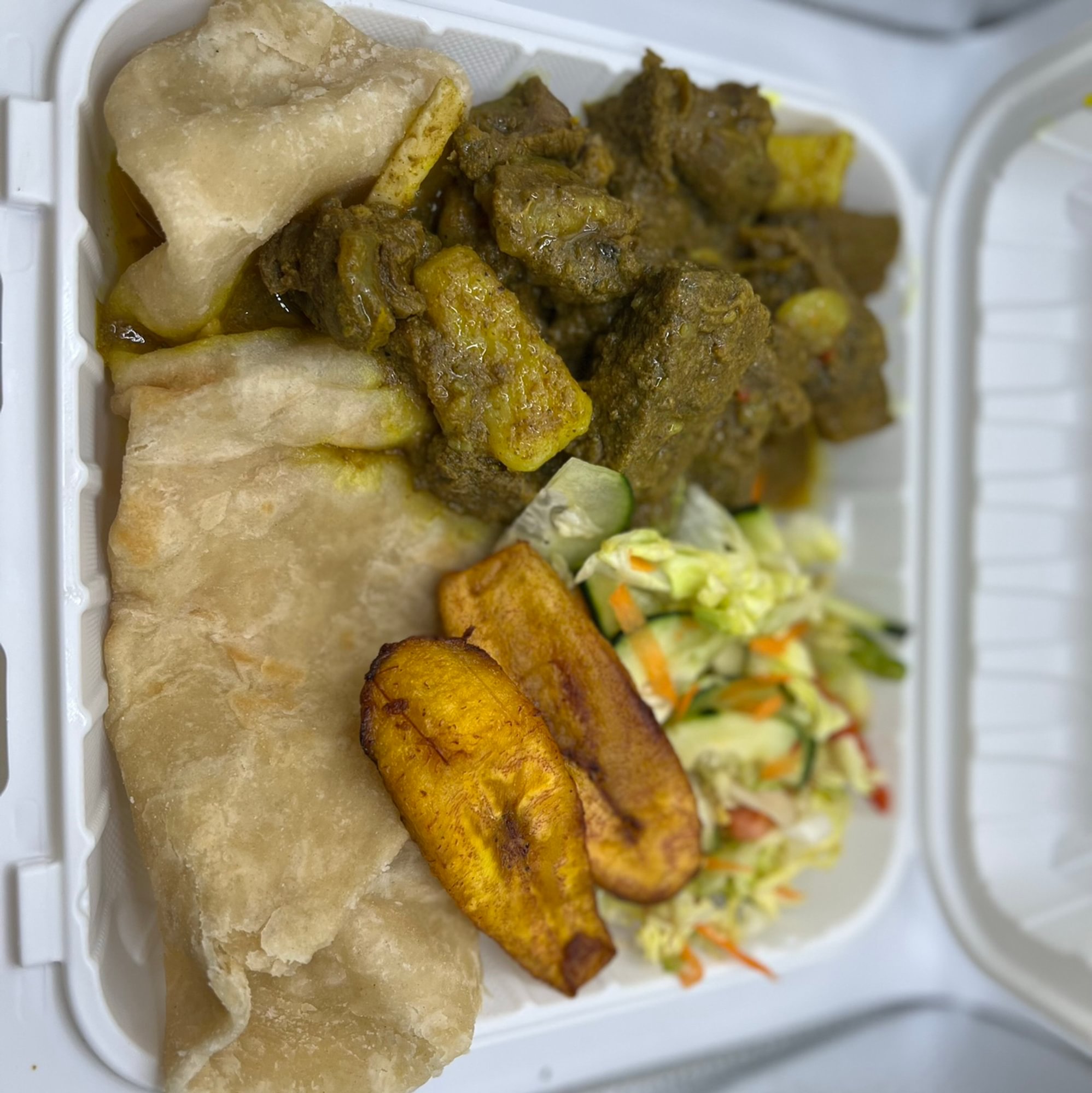 L Curry Goat Roti