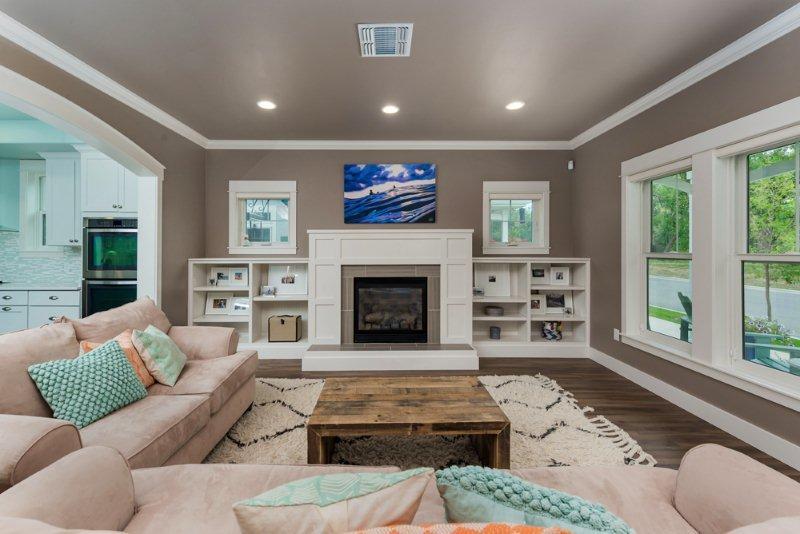 The main floor has a livingroom with gas fireplace and built-ins, a formal dining area,a custom kitchen with Birch cabinets, all appliances, pantry and a large island. Don't miss out on this fabulous home.