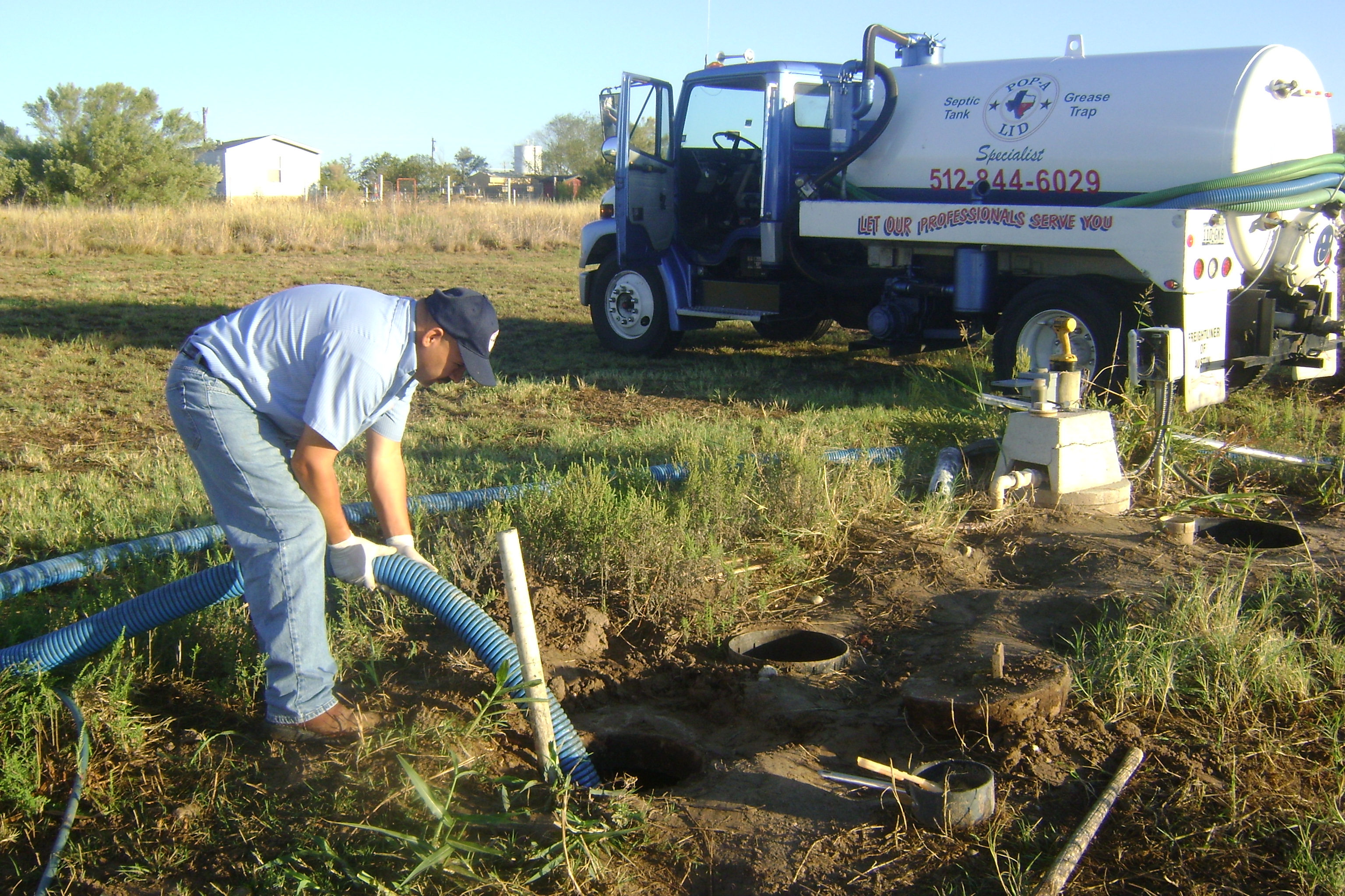 Pop-A-Lid Septic & Grease Trap Services Photo