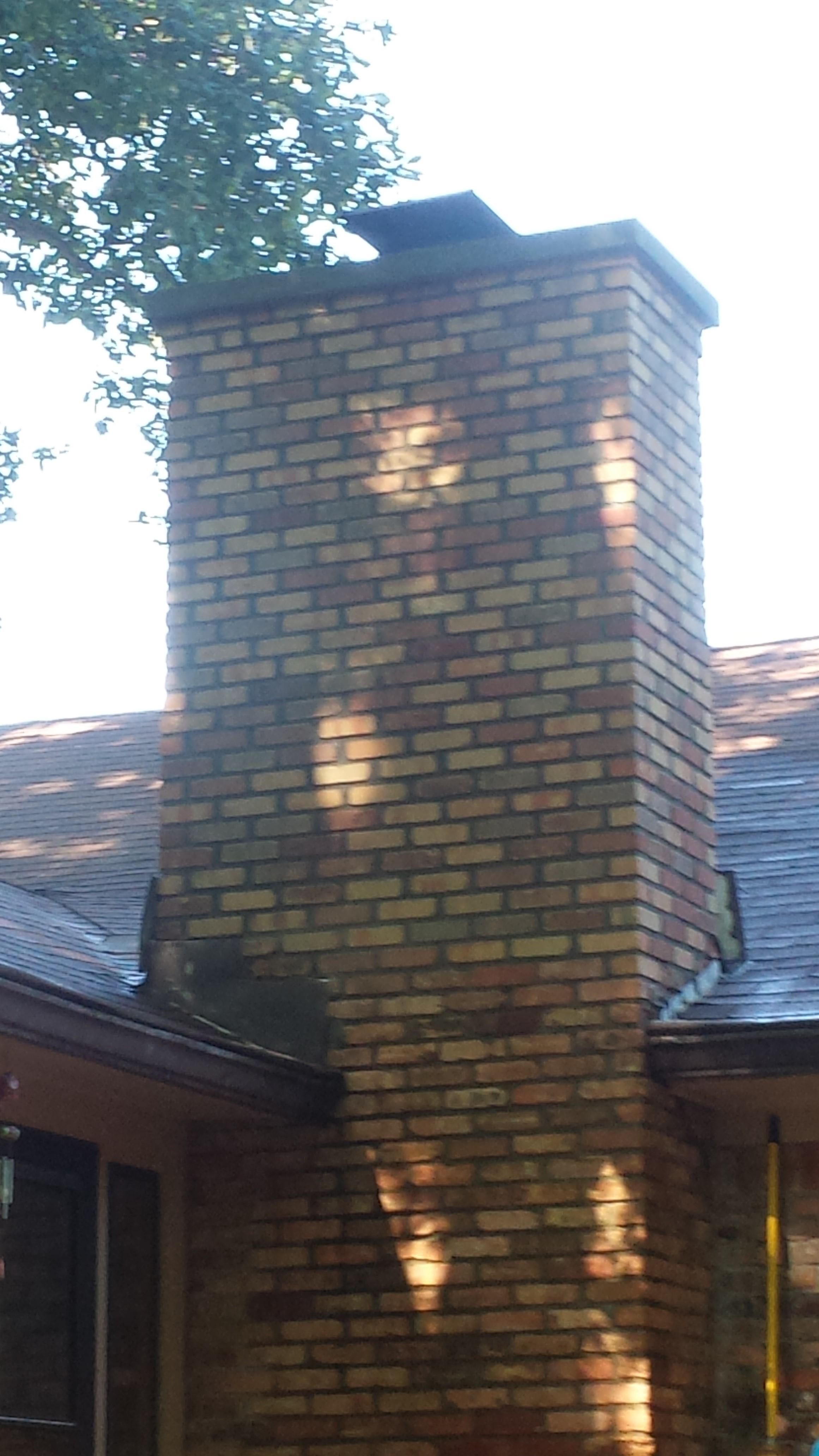 After demo and replacement of the masonry we installed a new cap and sealed entire chimney.