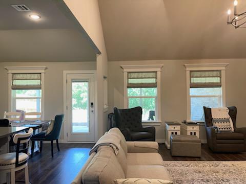 Sometimes all you need is something subtle for the windows. That was the case in this Collinsville home! Here, you can see our Roman Shades, which we installed in the master bedroom and the living room. The spare bedroom received Roller Shades!