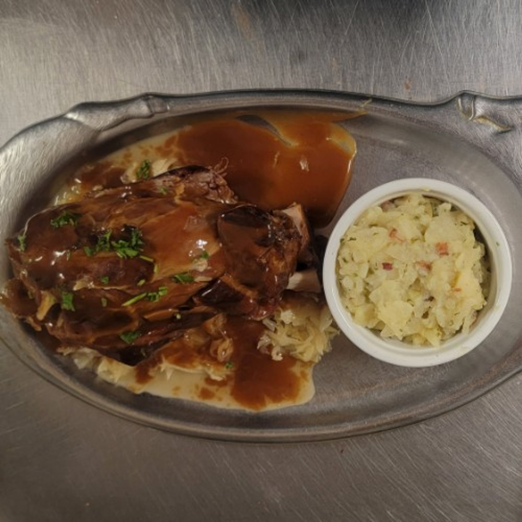 Smoked Pork Shank Over Sauerkraut