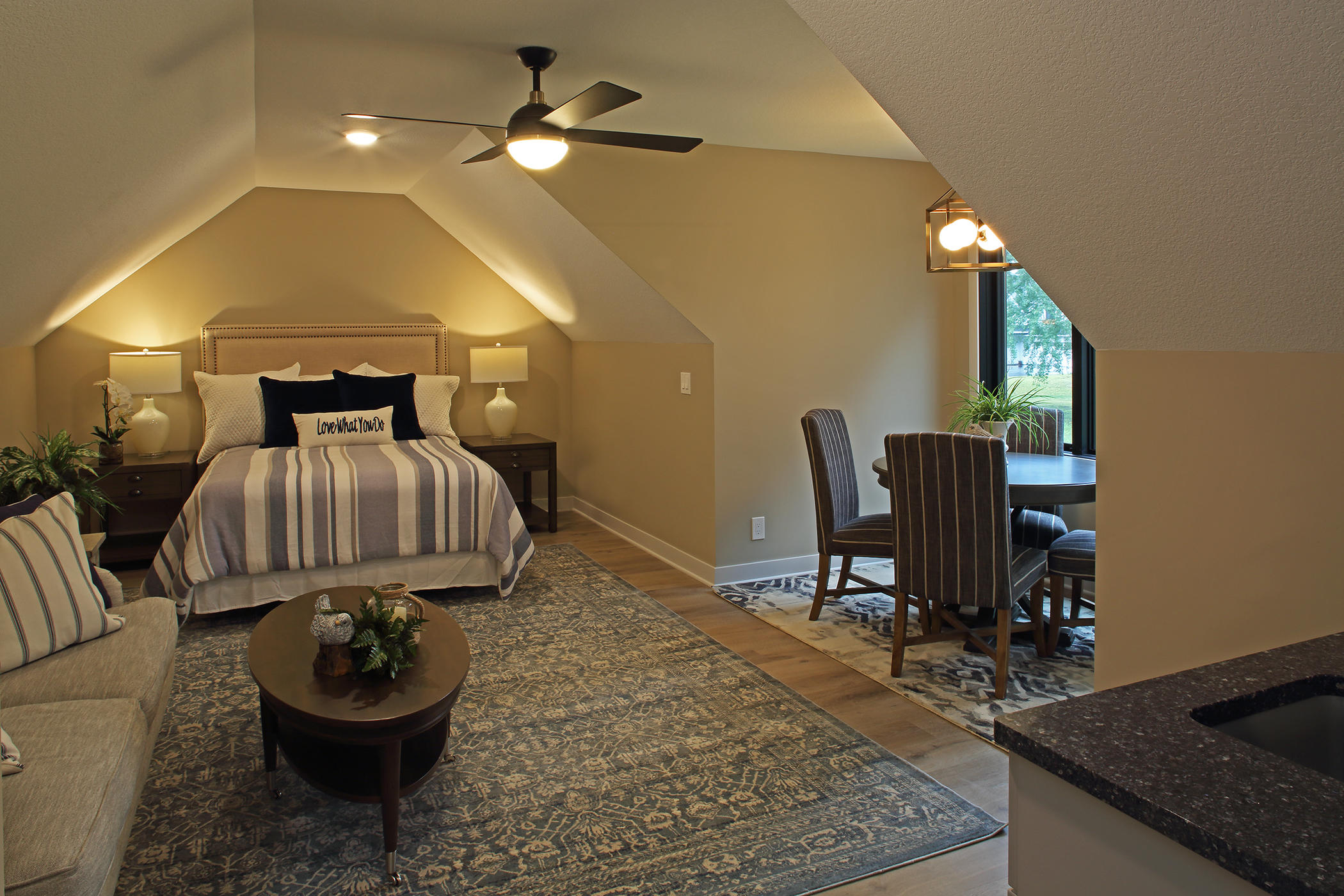 This charming guest suite is cozy but also open with kitchen/dining area and full bathroom.