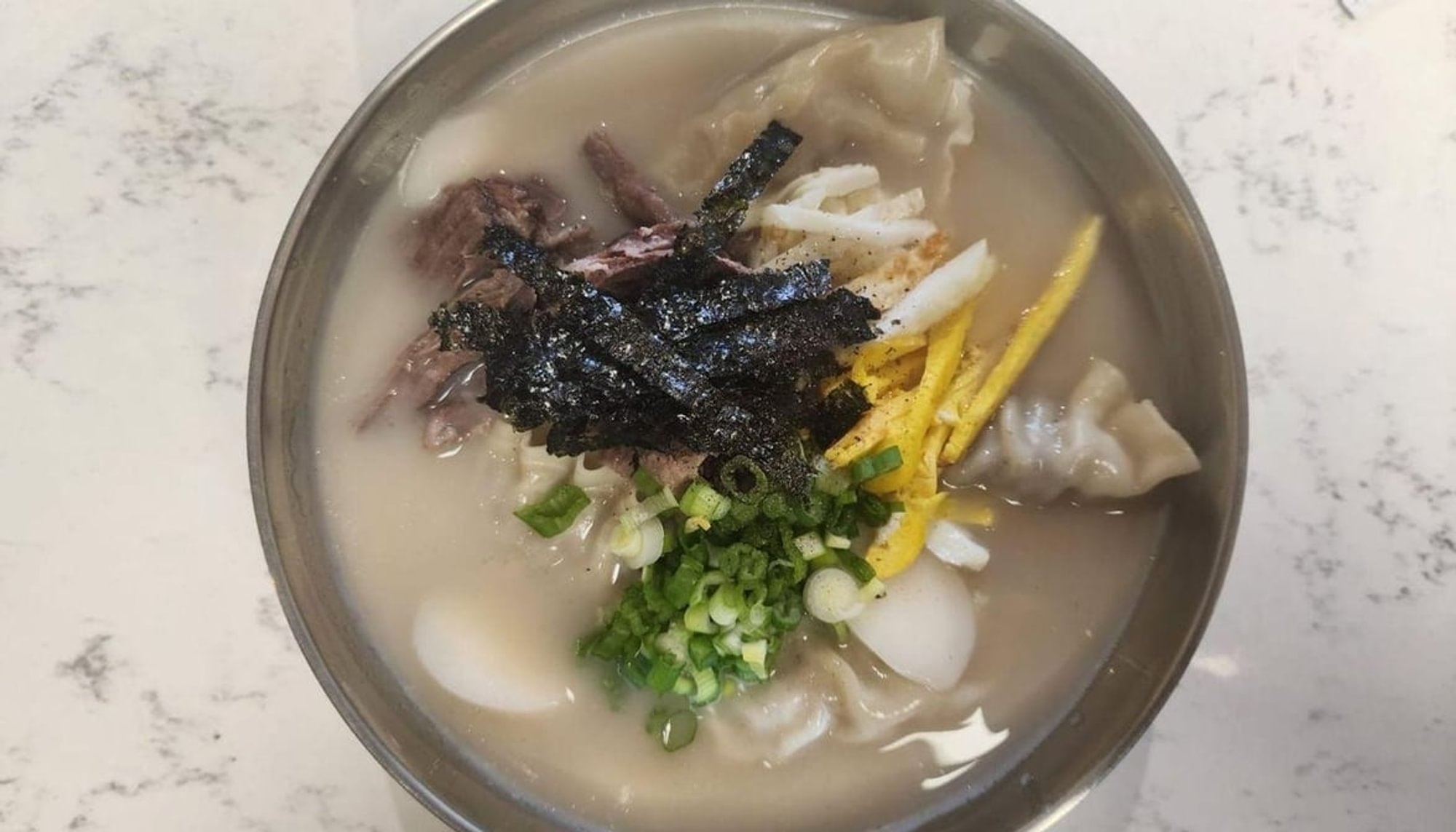 Tteok Mandoo Guk (Rice Cake Dumpling Soup)