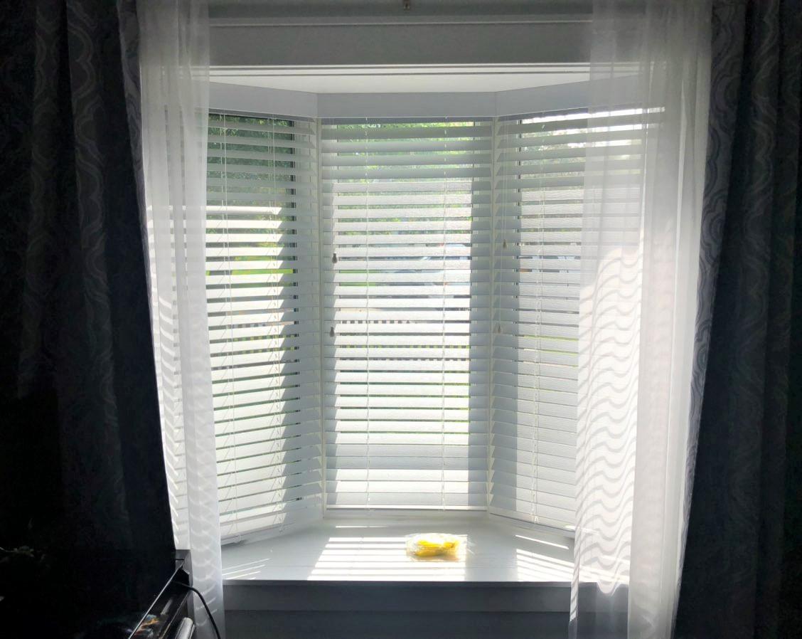 Blinds in a Bay Window