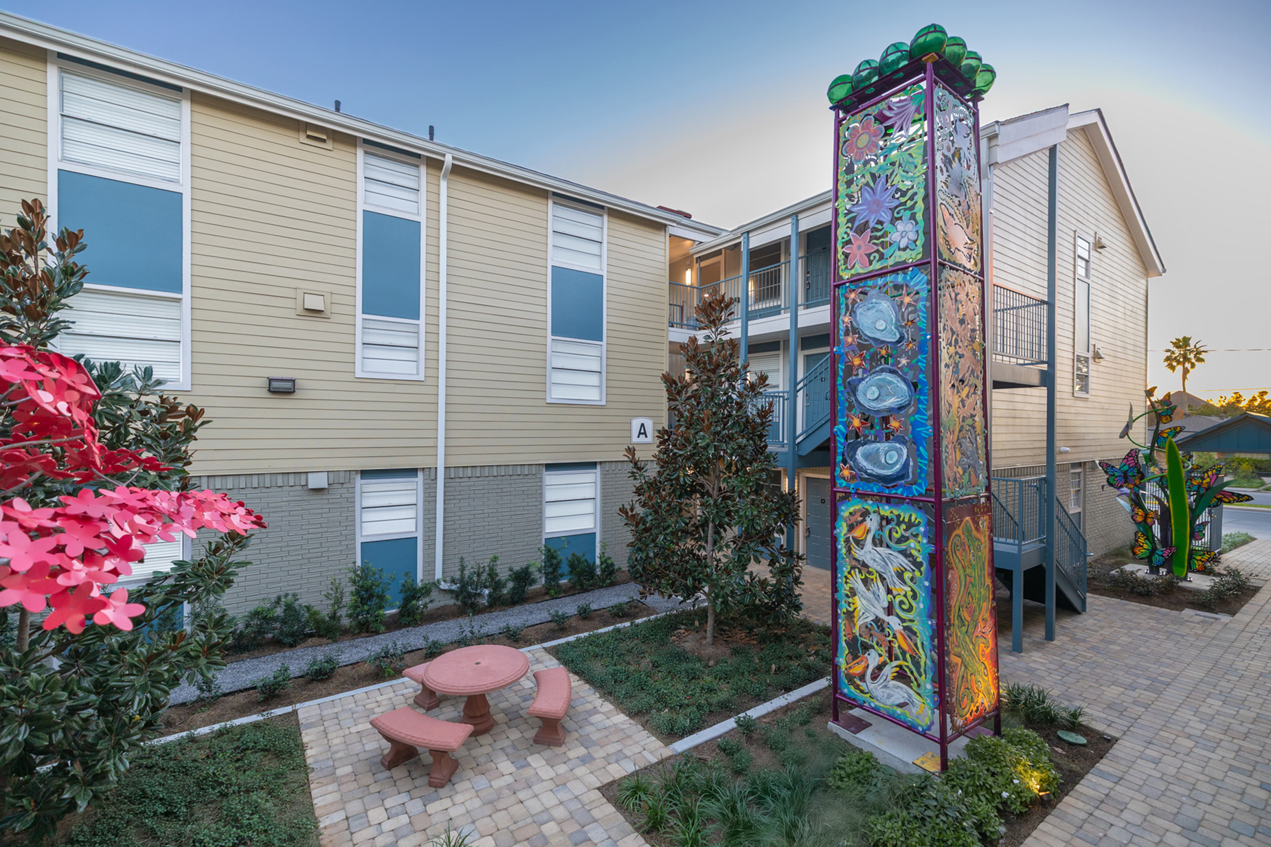 Courtyard Gallery with Art Work & Seating Area