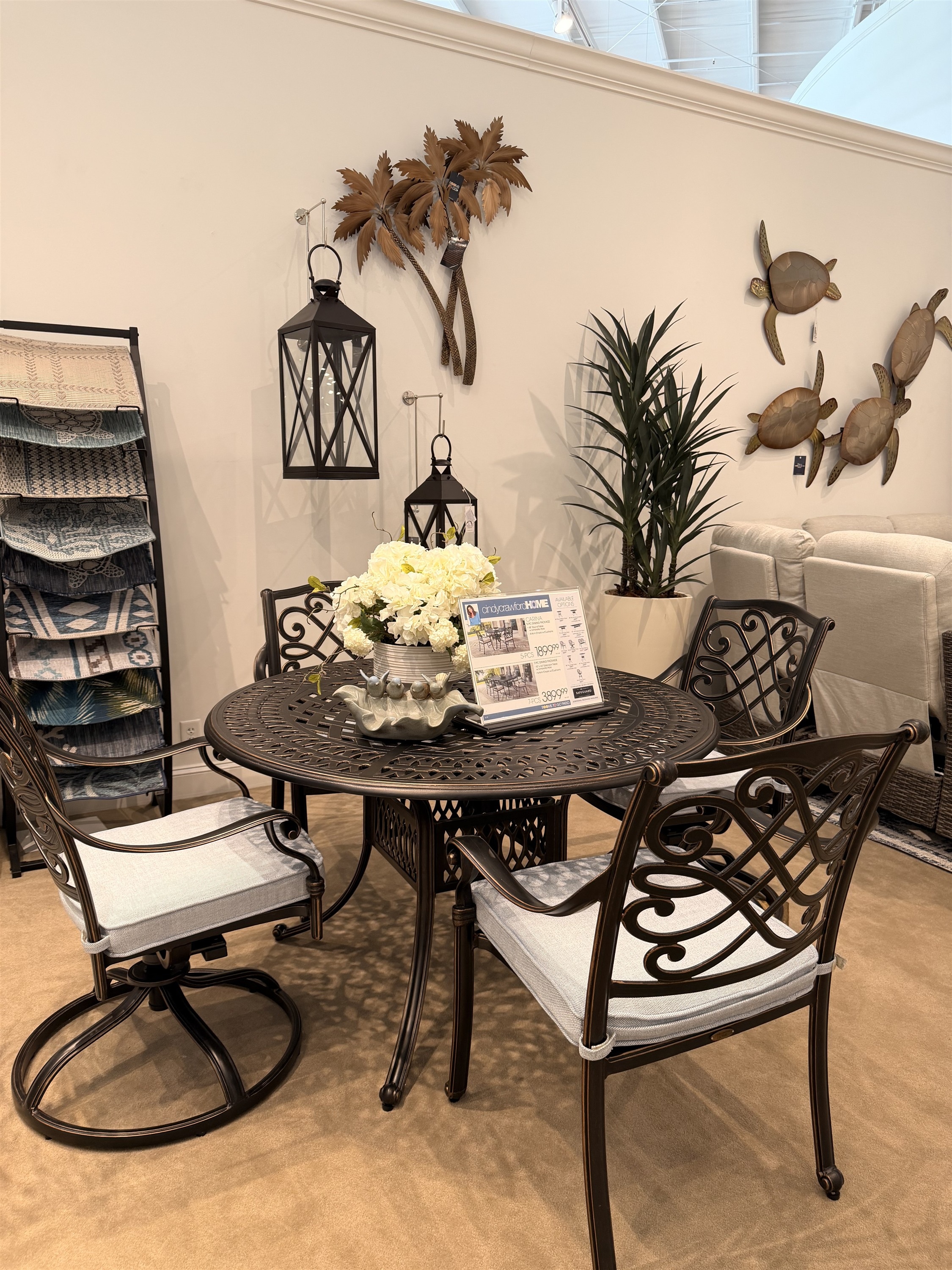 Bring timeless style outdoors with this bronze wrought-iron dining set and scrollwork table, from the Rooms To Go 2026 Cindy Crawford collection.