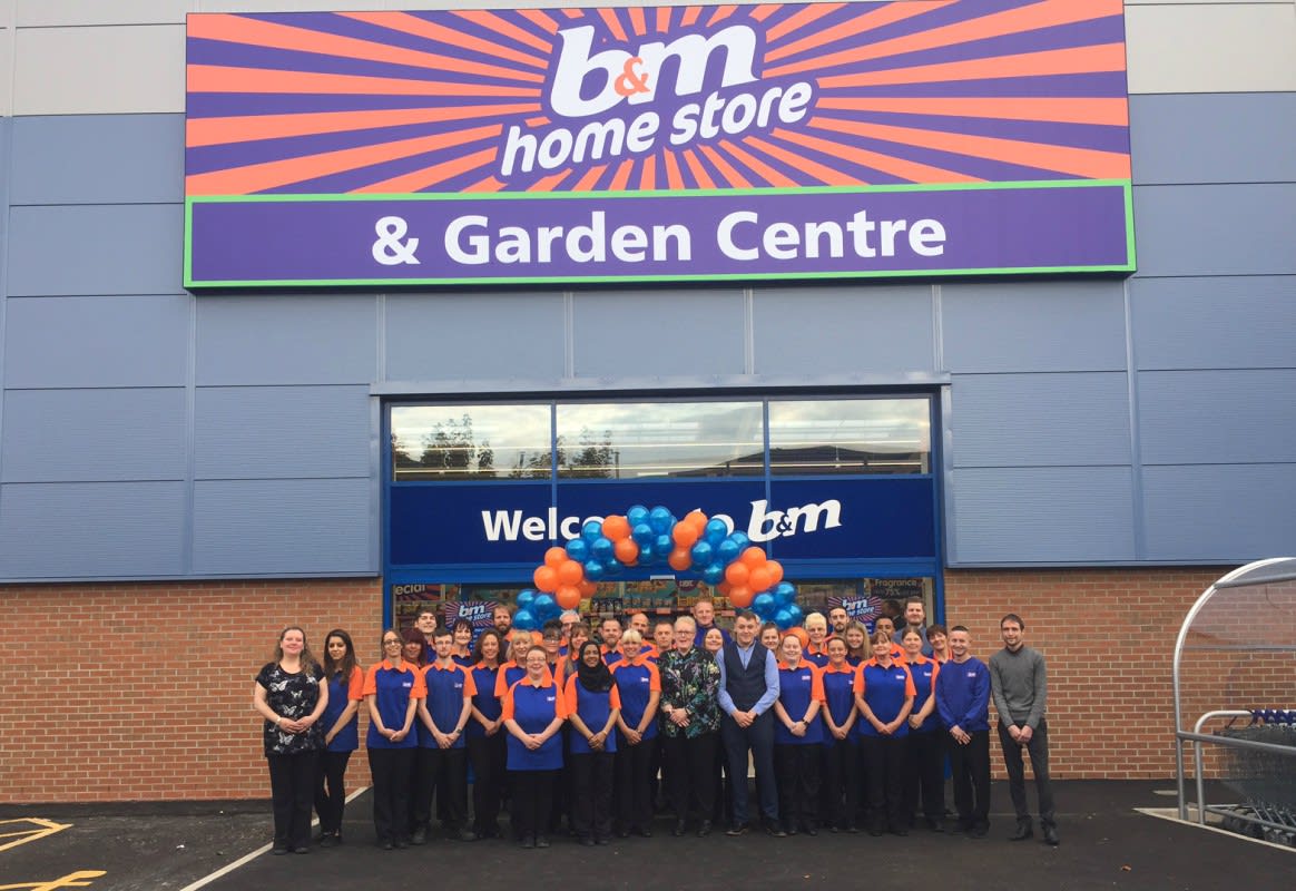 B&M Chadderton's store team pose outside their brand new store at Gateway Retail Park.