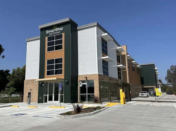 Outside view of modern three story self storage facility entry way at SmartStop in Goleta, CA on Kellogg Ave.
