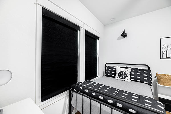 Black is the new white! Mix it up with black window coverings. Very stylish!