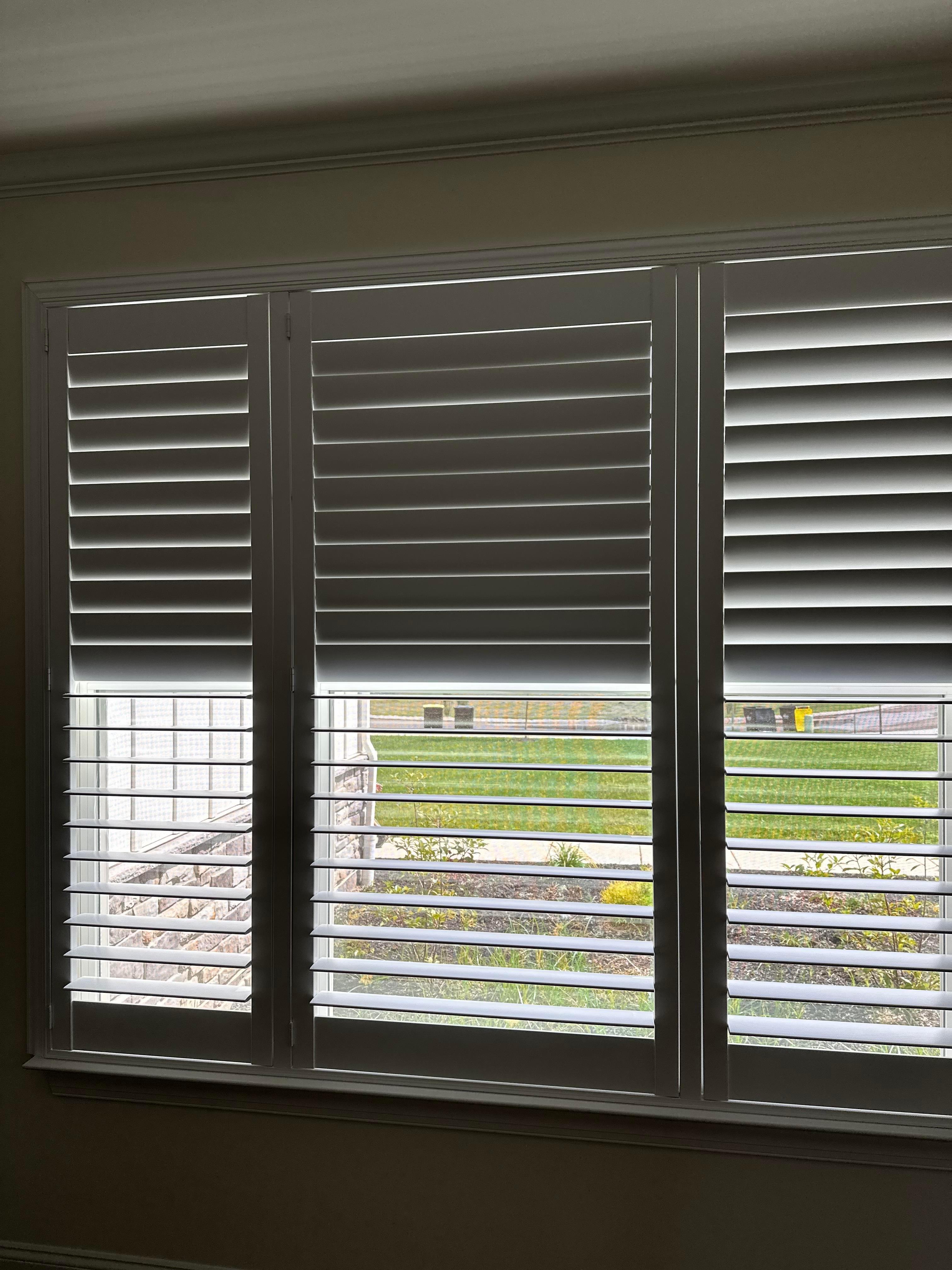 Shutters are timeless and allow customizable light control and privacy.