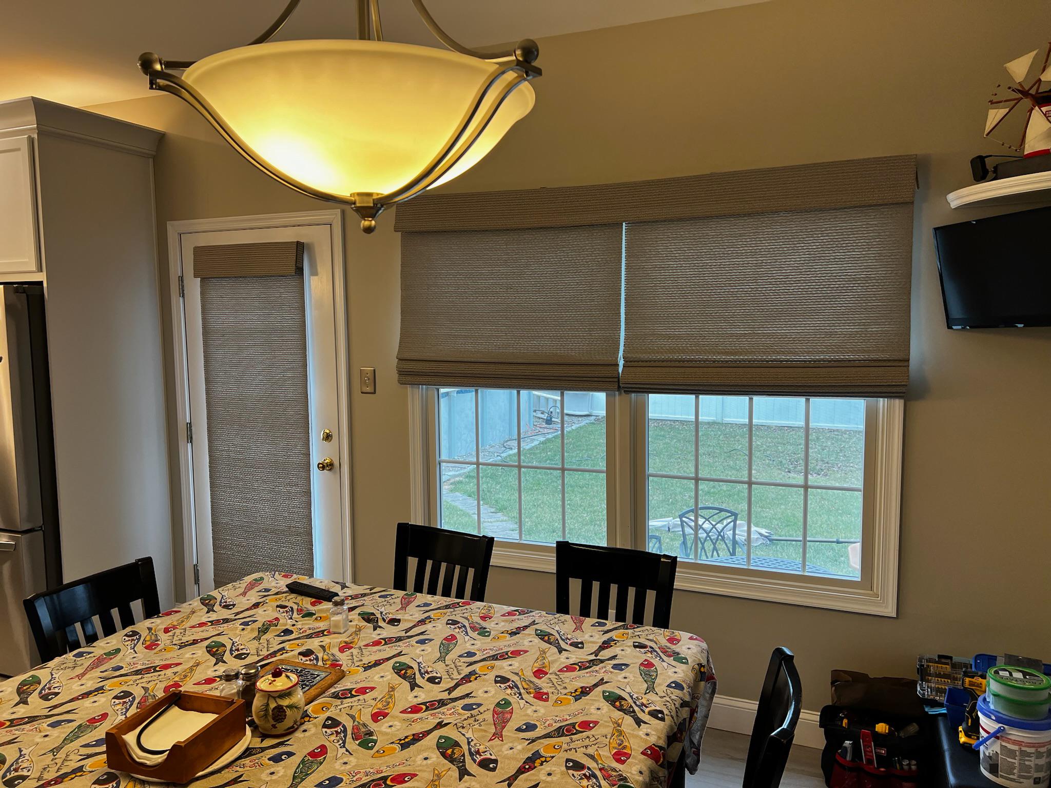 Roman shades come in a variety of beautiful fabrics to match any decor.  They are great for both doors and windows, providing privacy and light-filtration.