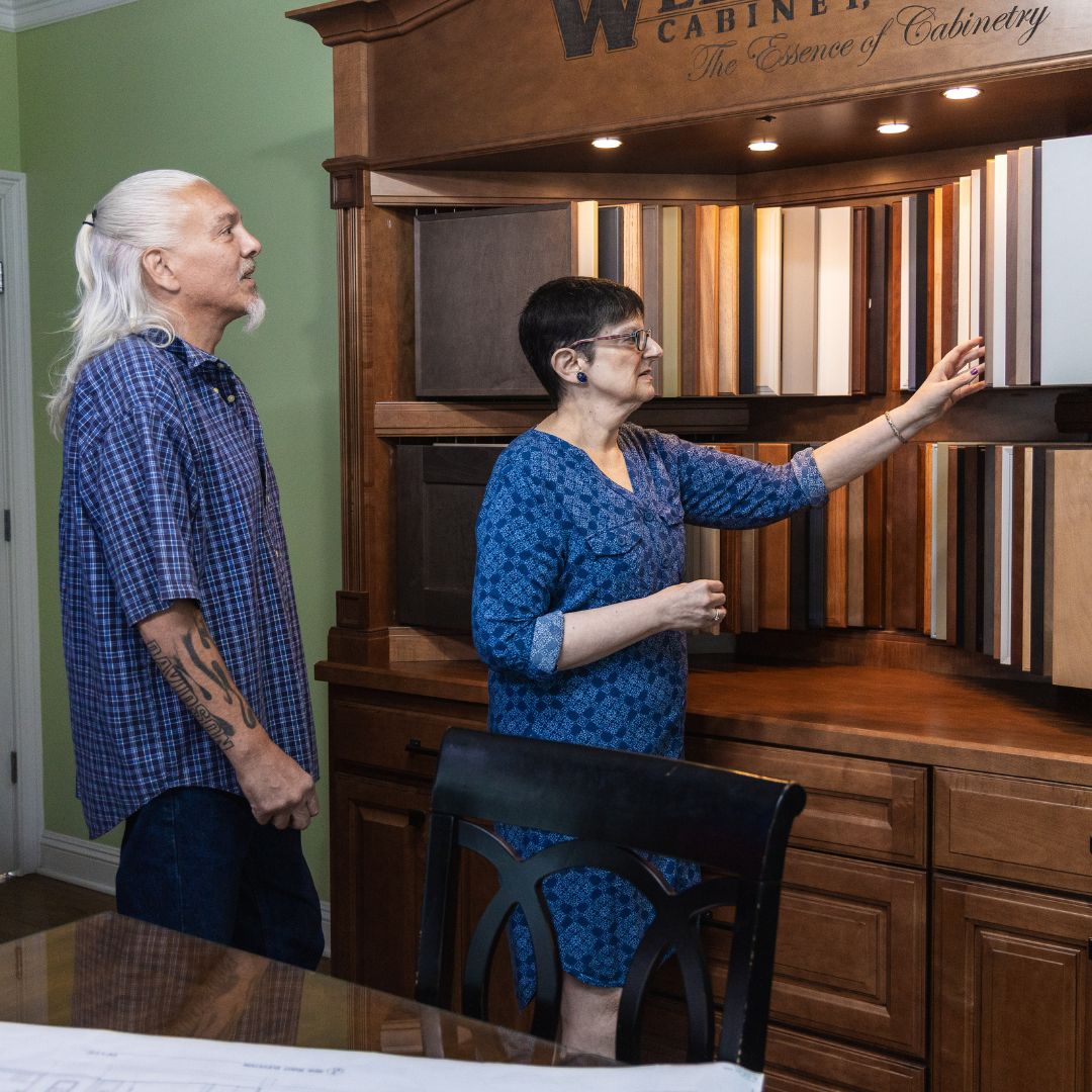 Clients browse a wide variety of cabinet door styles and stains in the Fiderio showroom.