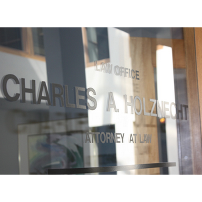 Charles a. Holznecht Attorney at Law
