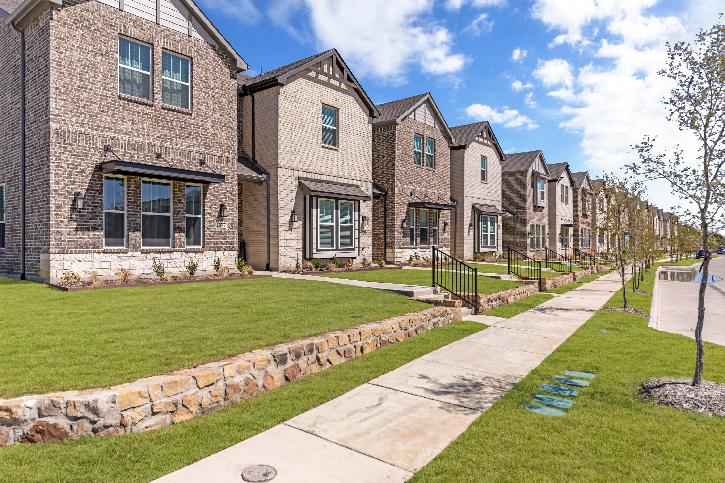 The  Station Townhomes by Ashton Woods in Sachse TX