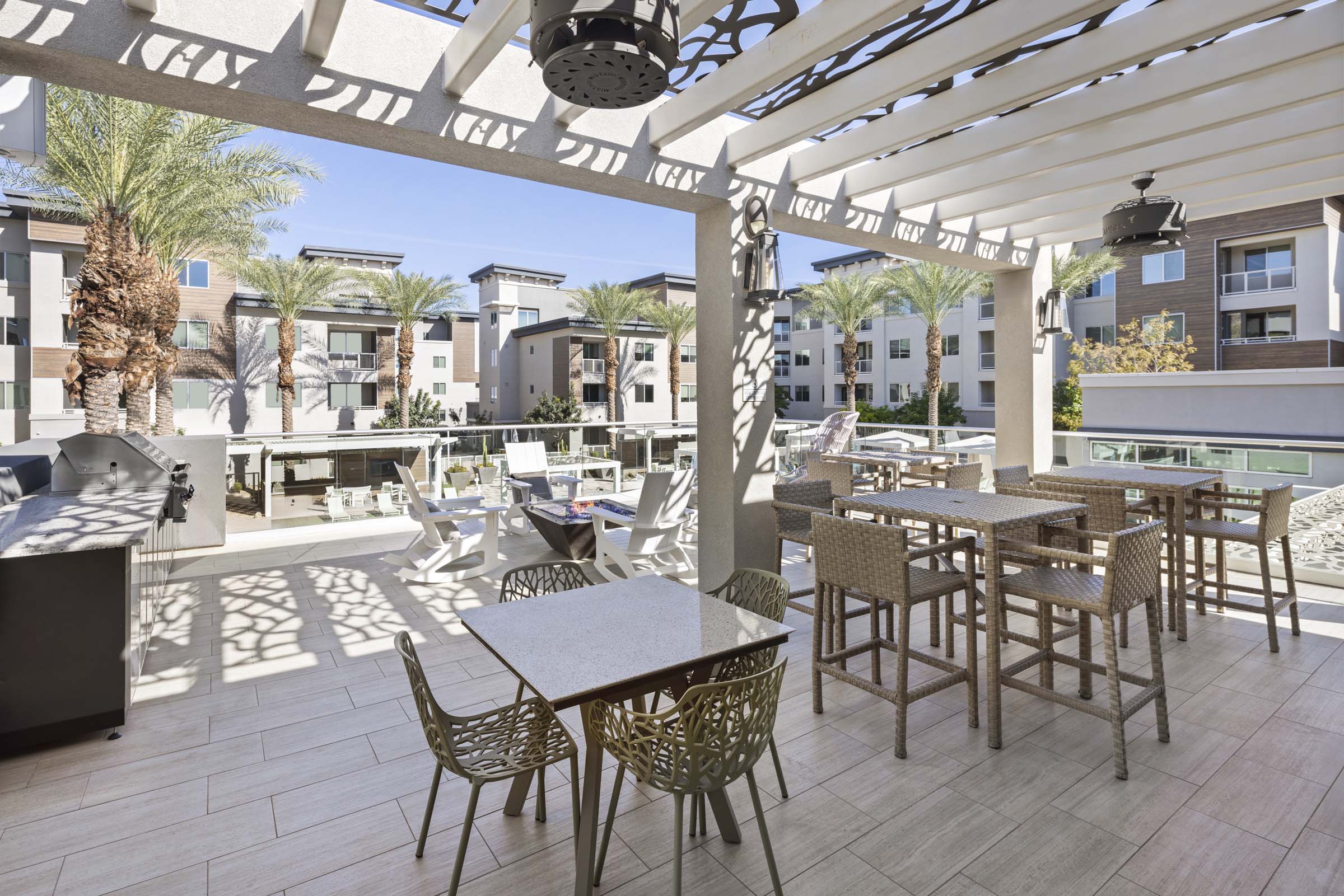 Outdoor resident lounge with barbecue grills and dining areas