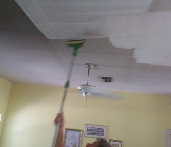 Prepping the ceiling after smoke damage. We know smoke and soot damage is not pretty and can get everything and leave a smell that seems like it'll never leave your home or business, but rest assured, we have the proper training and equipment to handle these situations.