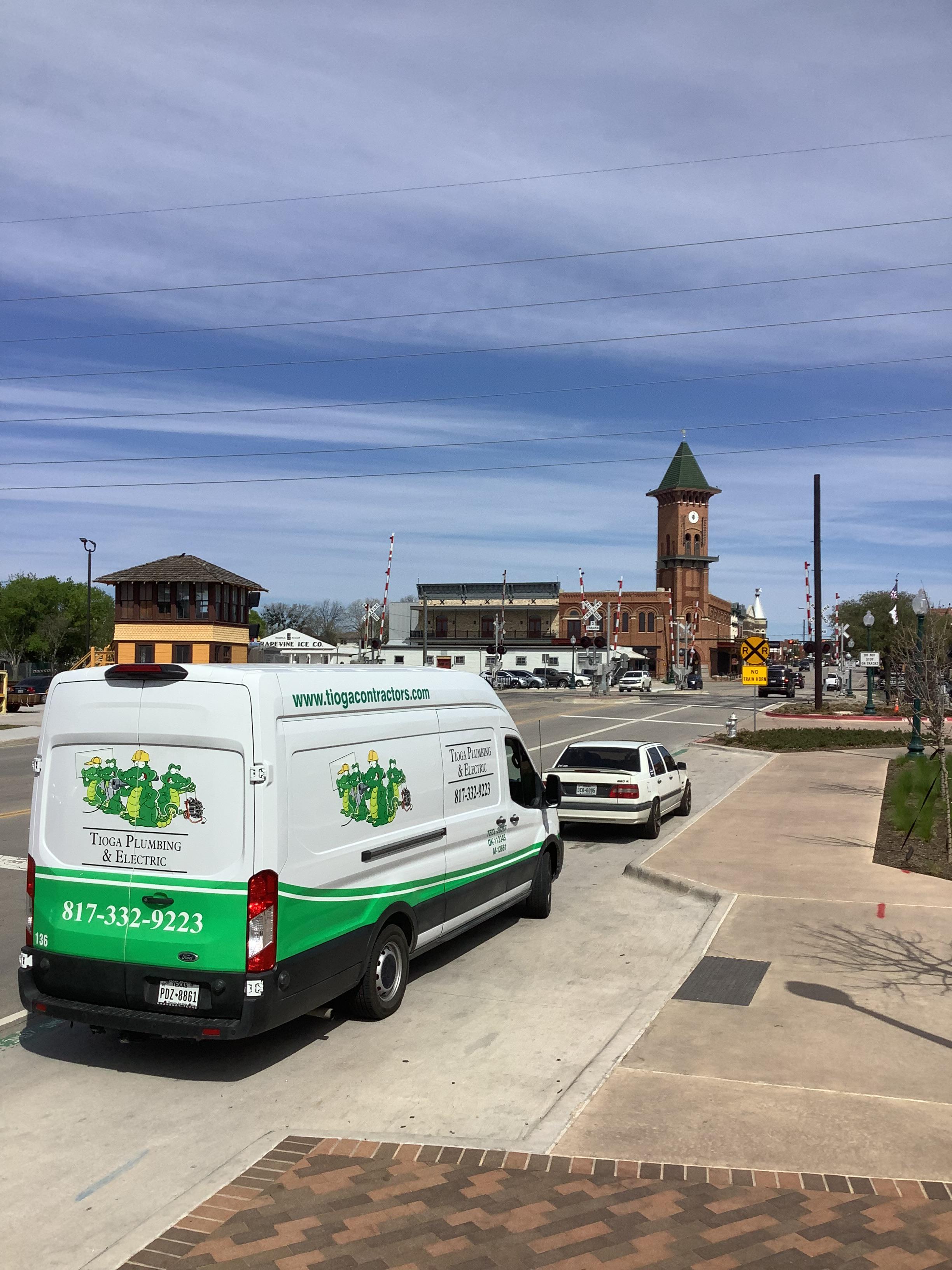 The Tioga Plumbing & Drain service van in Downtown Grapevine Texas.