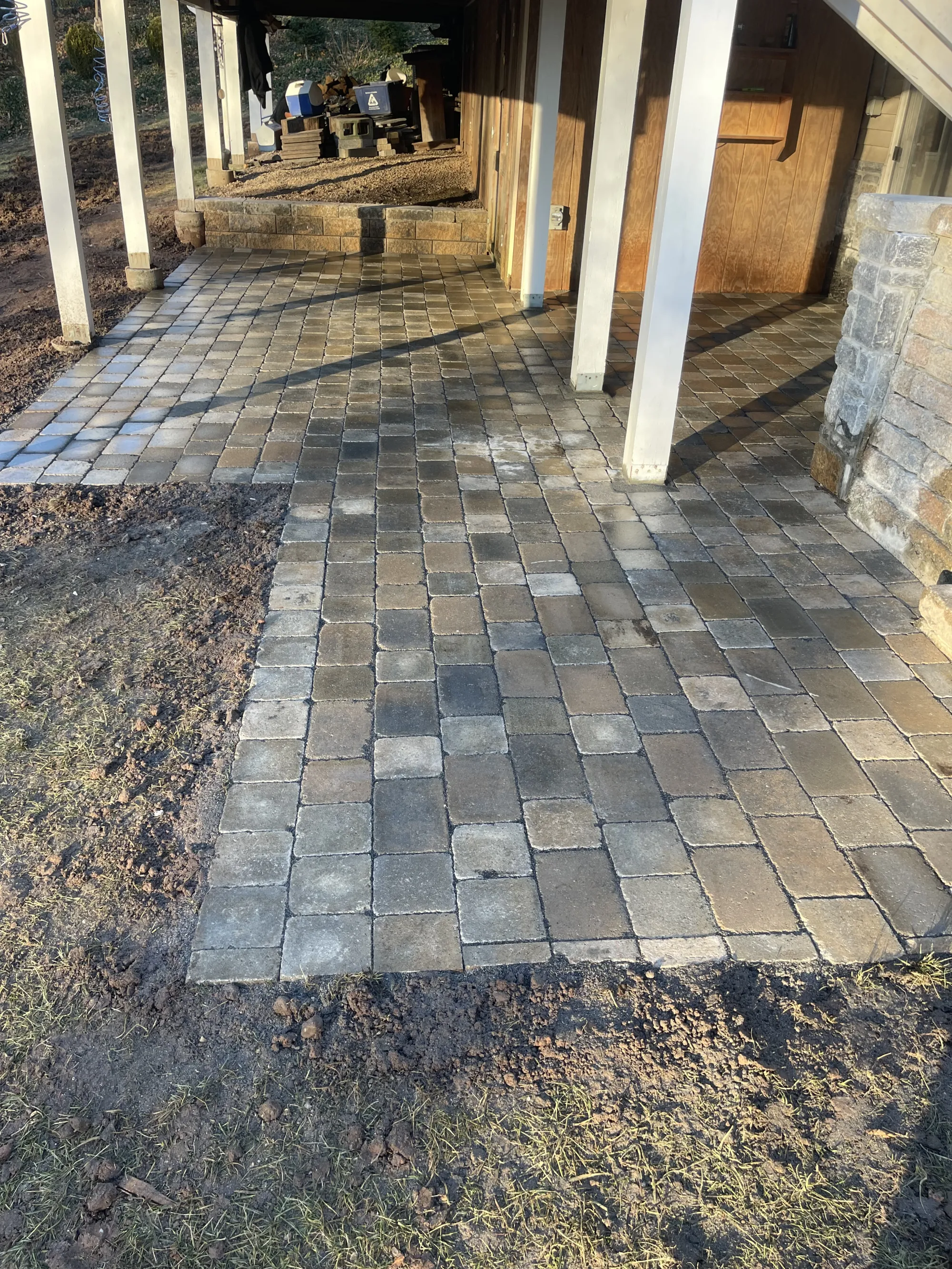 Finished paver patio detail - Patios project by General Masonry LLC.