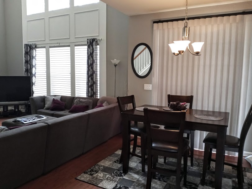 This lovely home just experienced a refreshment of window treatments, getting rid of the old aluminum and vertical blinds that were formerly in place. Now the window shadings and SmartDrapes bring a soft and elegant look to the space while maintaining full privacy.