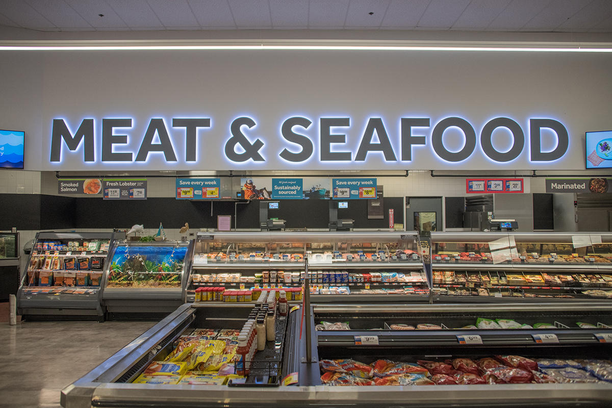 Wide shot of meat and seafood department.