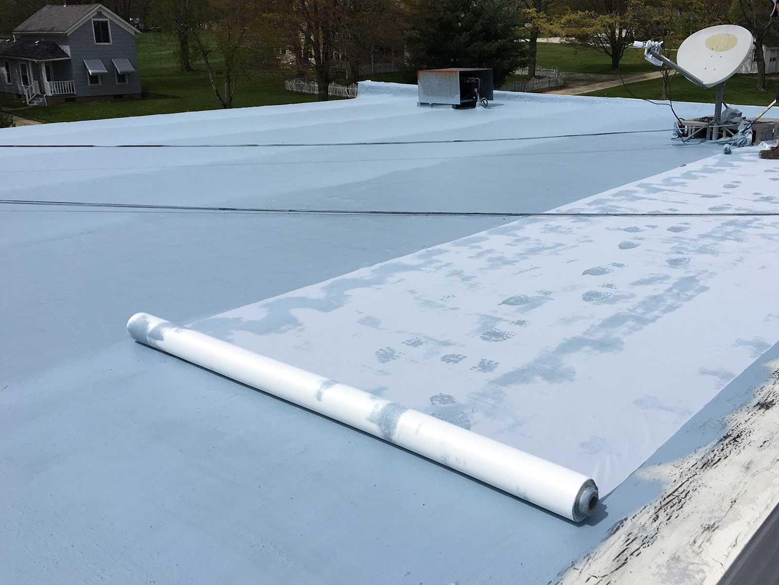 Fabric-Reinforced Roofing System