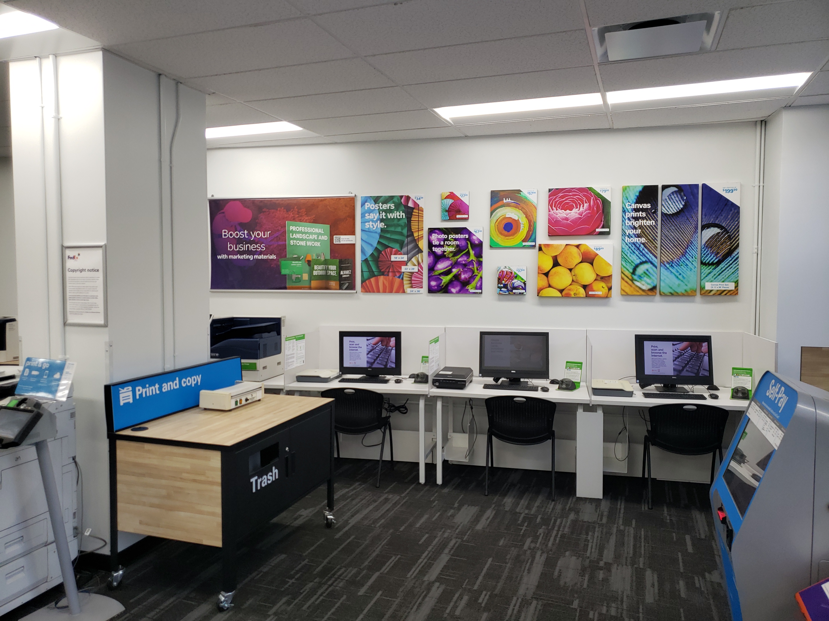 Sample Wall and Print Inspiration &ndash; Sample wall showcasing posters, signage, and print products available at FedEx Office Manhattan location.
