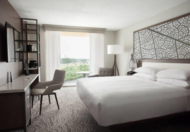 These stylishly appointed rooms offer a king bed, workspace and views of the lake.